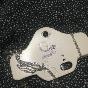 Brand New bedazzled angel wings necklace